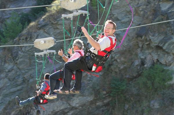  (L to R) Henry van Asch, AJ Hackett Bungy board member Andy Brinsley and CEO Dave Mitchell try out the new Kawarau Zipride. 